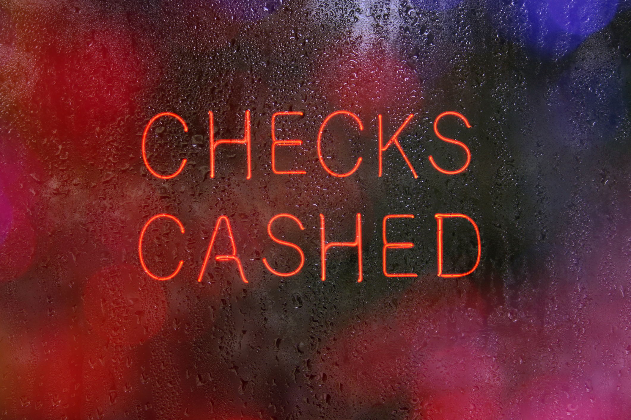The words "CHECKS CASHED" in a window.