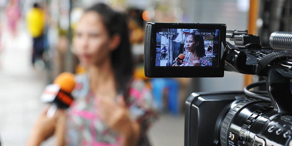 media-interviewing-woman_247635094