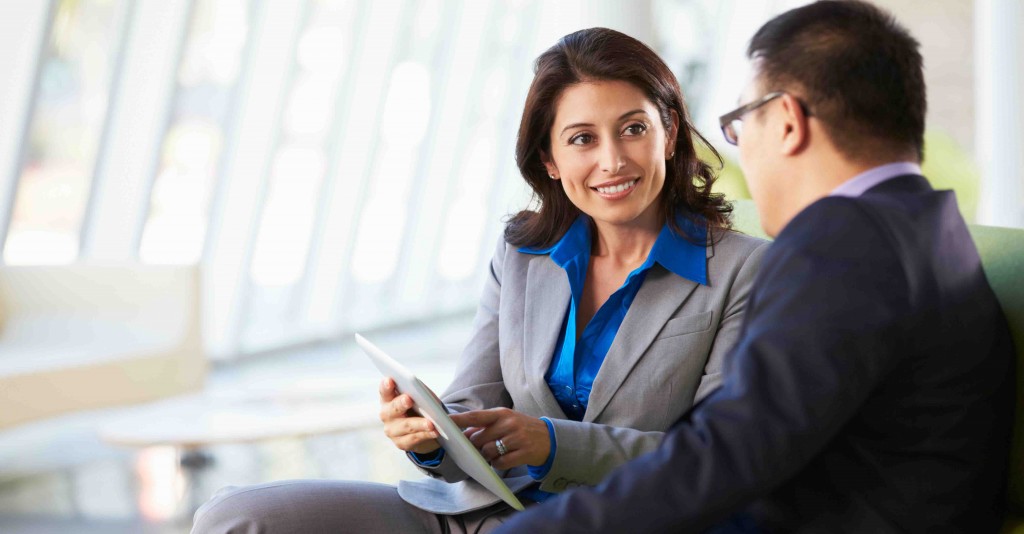 Two people discussing financial goals. 